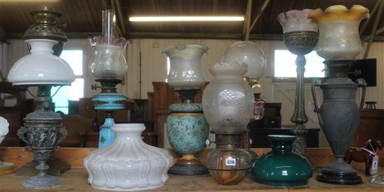 Collection of oil lamps & shades